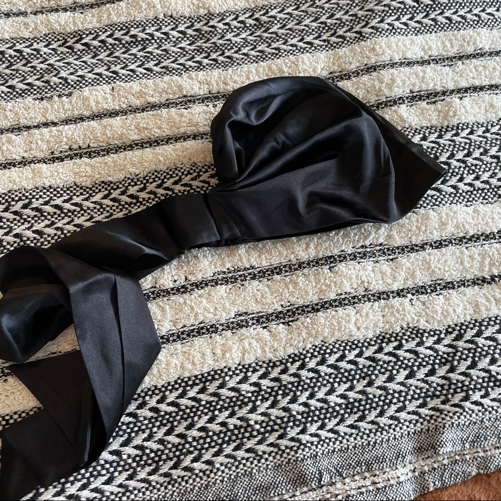 New in package satin black surturban with pony tail hole